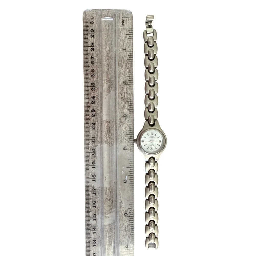 Express LAX1336 Wrist Watch Date Water Resist Silver Tone 7 Inch Womens